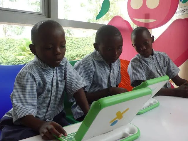 Pupils at Kagugu Primary School in Kigali using OLPC XO laptops during a digital literacy lesson in 2008